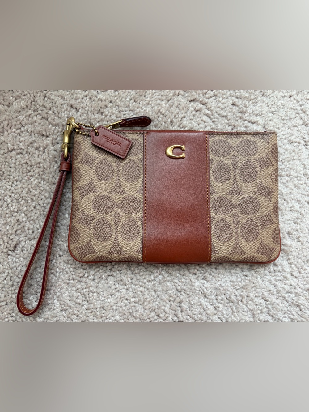 Coach small wristlet in Signature Canvas/Brass/Tan/Rust